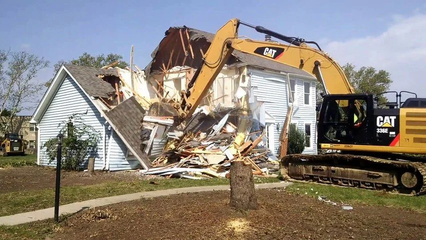 Demolition equipment clearing a building site